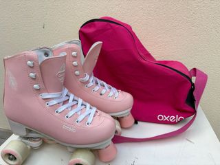 Patines Oxelo rosa , bolsa incluida