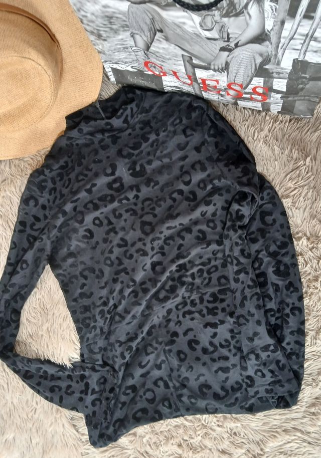 Enterizo negro animal print - L traslúcido