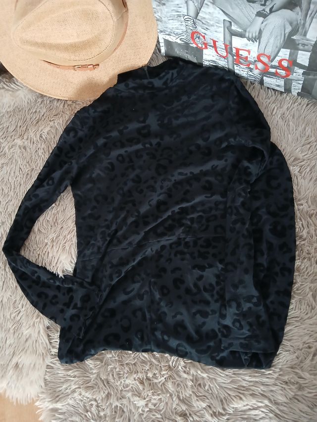 Enterizo negro animal print - L traslúcido