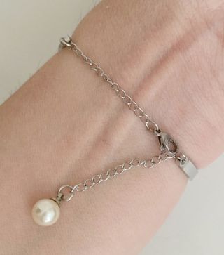 Pulsera acero-perla.