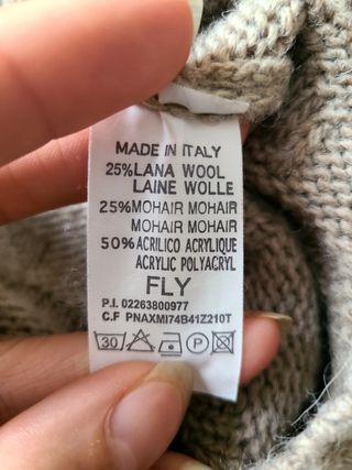 Maglione beige collo alto lana