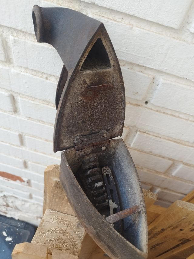 Plancha antigua de hierro