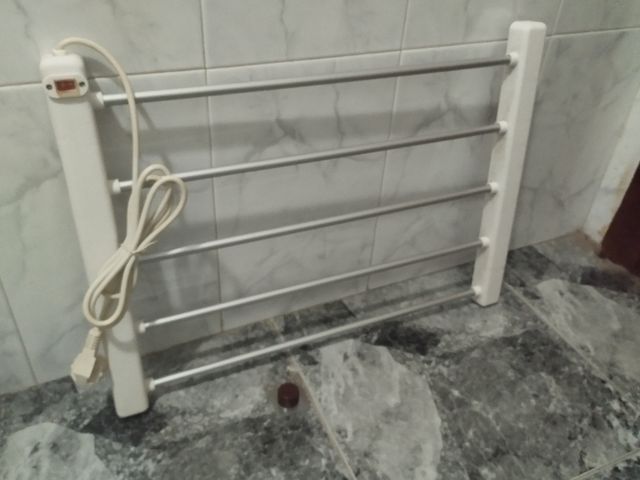 Secador de toallas eléctrico