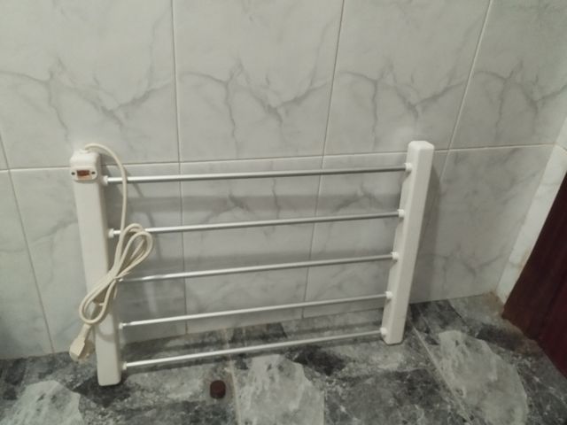 Secador de toallas eléctrico