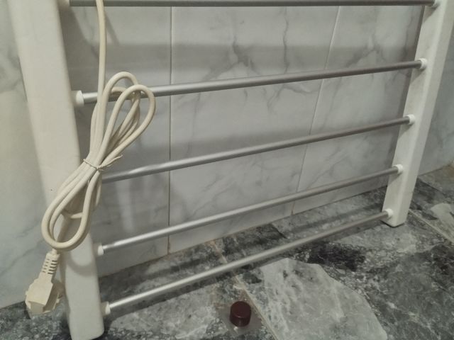 Secador de toallas eléctrico