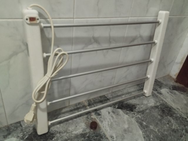 Secador de toallas eléctrico