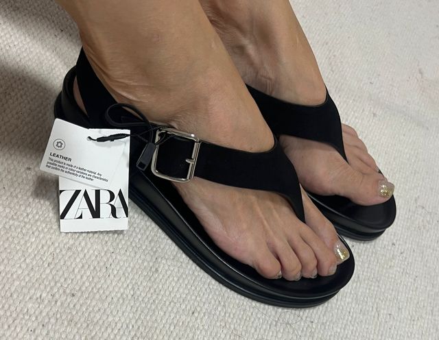 Sandalias planas negras piel