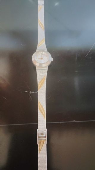 Reloj Pino dorado y plateado