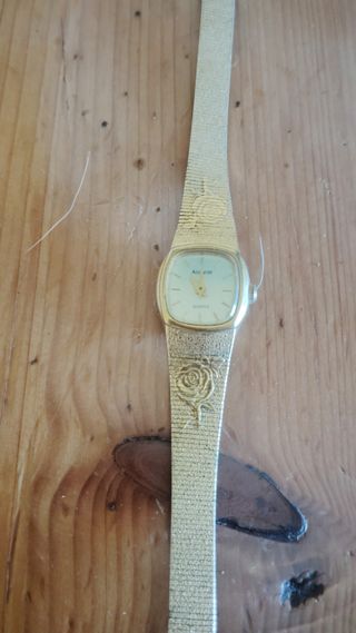 Reloj Pino dorado y plateado