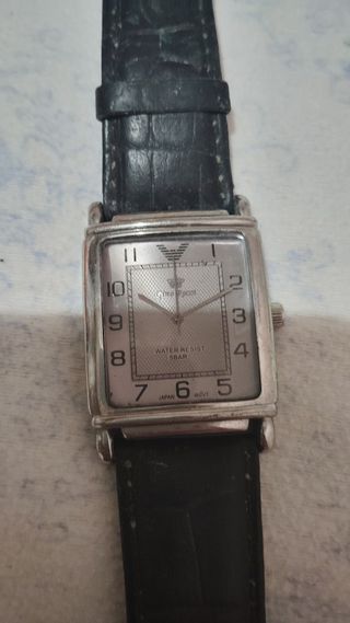 Reloj Pino dorado y plateado