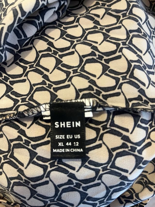 Vestido corto beige y negro