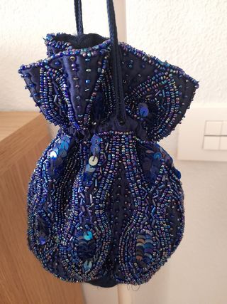 Bolso de mano azul con lentejuelas