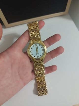 Reloj dorado mujer