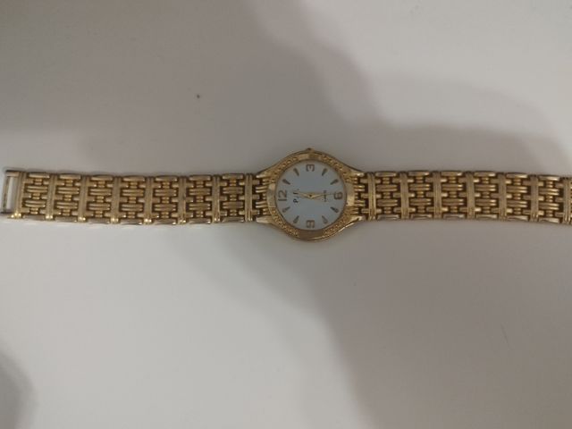 Reloj dorado mujer