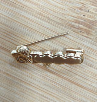 Alfiler bebe oro 18 ktes.