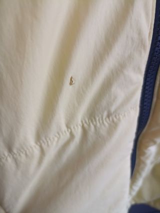 Chaqueta The North Face amarilla y negra