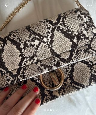 Bolso bandolera serpiente beige-negro nuevo.