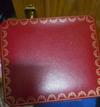 Caja Cartier roja y dorada