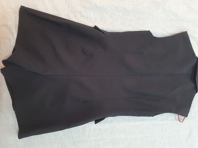 Mono negro elegante. Pantalón y chaleco.