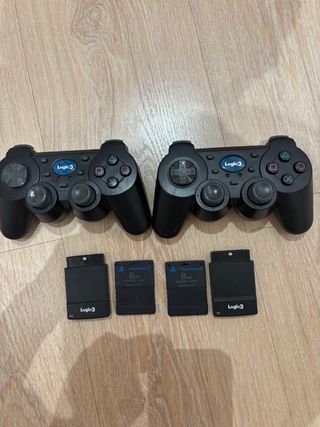 PS2 (PlayStation 2) + 4 juegos + 2 mandos