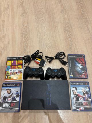 PS2 (PlayStation 2) + 4 juegos + 2 mandos