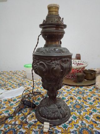 Antica lampada in peltro