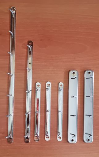 7 Perchas Metálicas Variadas - Plateadas