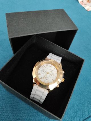 Reloj Angel Schlesser dorado y blanco