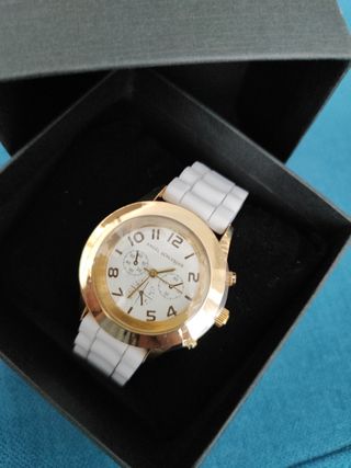 Reloj Angel Schlesser dorado y blanco