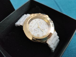Reloj Angel Schlesser dorado y blanco