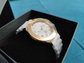 Reloj Angel Schlesser dorado y blanco