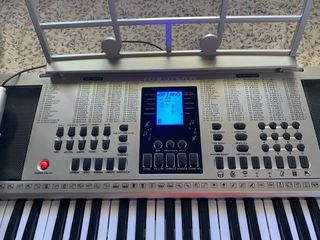 Piano teclado Playon FW11230 con atril y micrófono