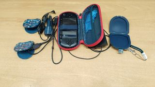 PSP E1004 + Accesorios + 2 Juegos
