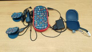 PSP E1004 + Accesorios + 2 Juegos