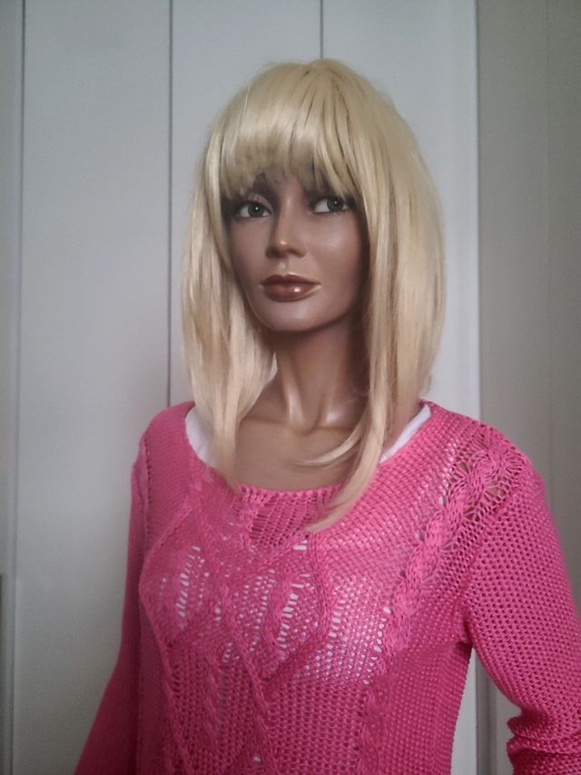 Maglioncino rosa lavorato a maglia