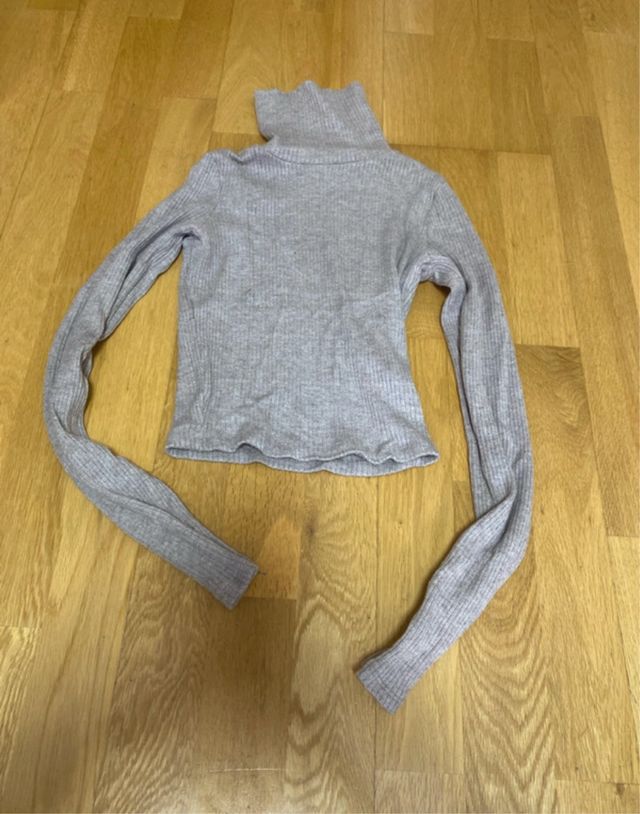 Top cuello alto beige