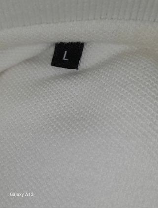 Polo blanco Adolfo Domínguez