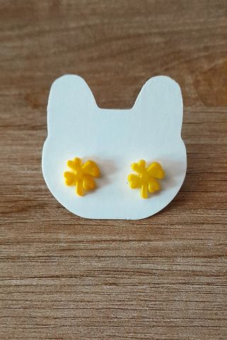 Pendientes: anclas, tréboles, niñas