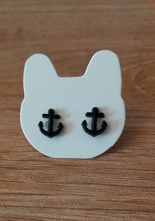 Pendientes: anclas, tréboles, niñas