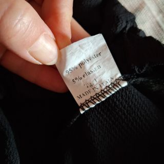 Shorts estivi neri morbidi con macramé