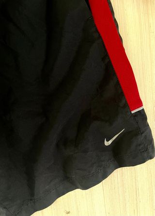 costume Nike nero