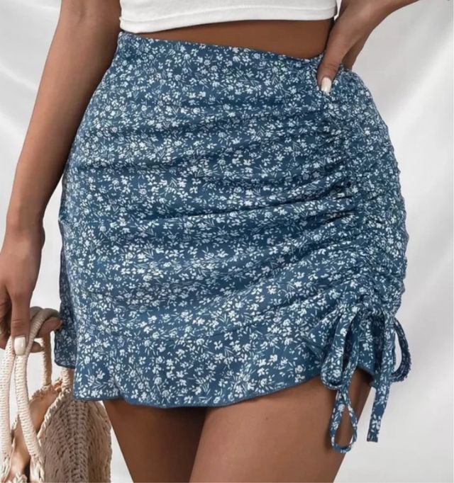 Mini falda azul estampada