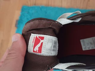 Zapatillas Puma rojas y marrones