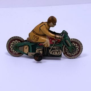 juguete Motorista Rai Paya en hojalata pintada