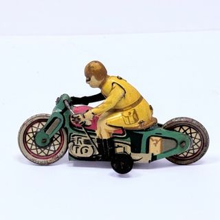 juguete Motorista Rai Paya en hojalata pintada