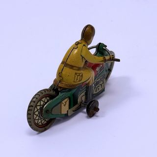juguete Motorista Rai Paya en hojalata pintada