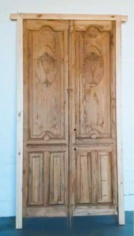 Puerta doble madera tallada