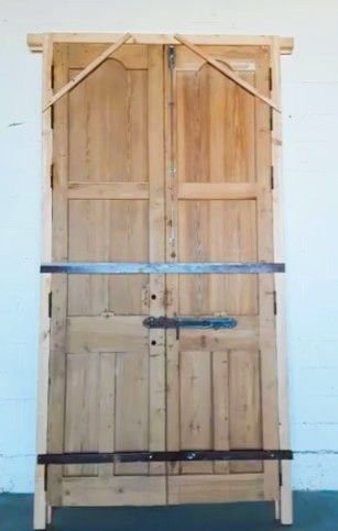 Puerta doble madera tallada