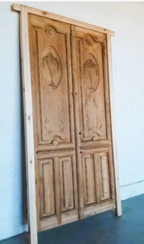 Puerta doble madera tallada