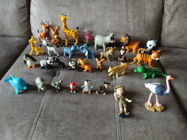 Libros y figuras de resina de animales del zoo